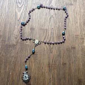 Rosary purple and w/ blue and green floral beads